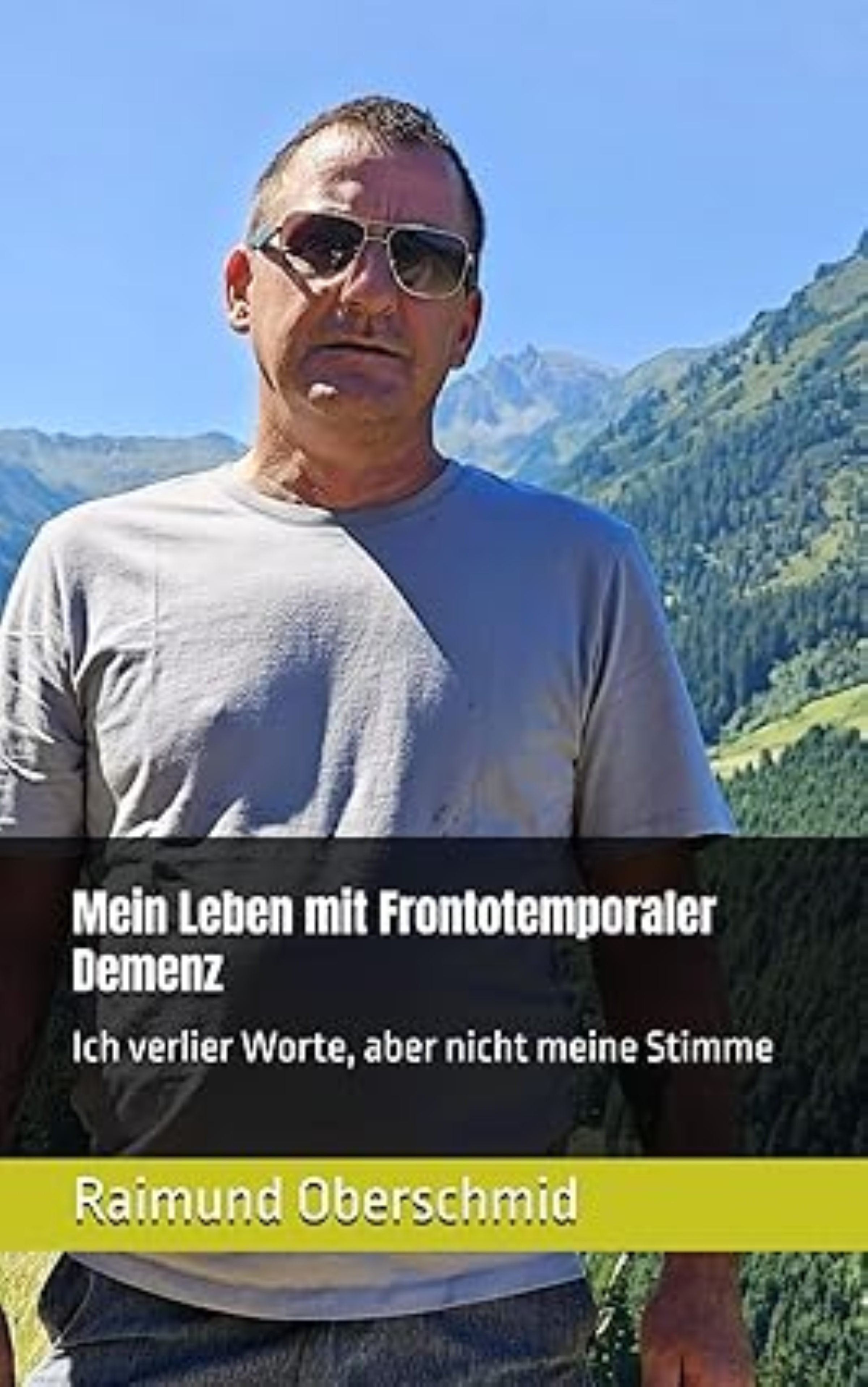 Das Cover zeigt einen Mann mit Sonnenbrille in der Natur, Berge im Hintergrund