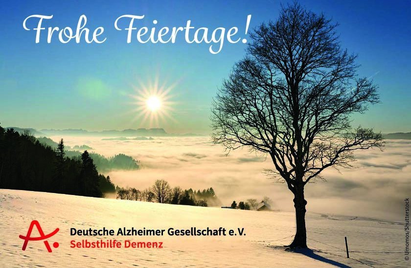 Schneelandschaft mit einem Baum, die Sonne strahlt